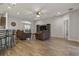 Open concept living room with kitchen and dining area at 8218 Wilder Loop, Lakeland, FL 33809