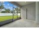 Screened porch overlooking backyard at 8218 Wilder Loop, Lakeland, FL 33809