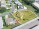 Aerial view showing house, large backyard, and neighboring properties at 1007 Canary S Cir, Lakeland, FL 33809