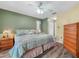 Spacious bedroom with king-size bed and wood flooring at 1007 Canary S Cir, Lakeland, FL 33809