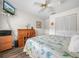 Bedroom with full-size bed and built-in desk at 1007 Canary S Cir, Lakeland, FL 33809