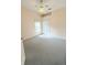 Cozy bedroom featuring a ceiling fan, carpeted floors and a large closet at 103 Paleo Point Ct, Winter Haven, FL 33880