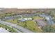 Complex overview, featuring pool and green space at 1600 W Lake Parker Dr # B9, Lakeland, FL 33805