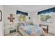 Bedroom with double bed, window, and nightstand at 1600 W Lake Parker Dr # B9, Lakeland, FL 33805
