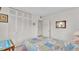 Bedroom with double bed, closet, and side table at 1600 W Lake Parker Dr # B9, Lakeland, FL 33805