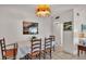 Dining room with table and chairs, and a stained glass lamp at 1600 W Lake Parker Dr # B9, Lakeland, FL 33805