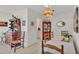Bright dining room with wood table and chairs, built-in hutch and buffet at 1600 W Lake Parker Dr # B9, Lakeland, FL 33805