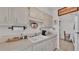 Kitchen with double sink and light wood cabinets at 1600 W Lake Parker Dr # B9, Lakeland, FL 33805