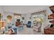 Living room with tiled floors, comfy seating, and large windows at 1600 W Lake Parker Dr # B9, Lakeland, FL 33805