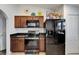 A well-equipped kitchen featuring stainless steel appliances and floral wall decor at 1640 Taylor Landing Dr, Bartow, FL 33830