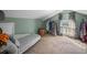 Attic room with sloped ceilings, a comfortable sofa, and ample storage space at 1841 Casco St, Lakeland, FL 33801