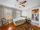 Bedroom showcasing a ceiling fan, hardwood floors, and natural light at 1841 Casco St, Lakeland, FL 33801