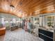 Bonus room showcasing wood ceiling, ample windows, and tile flooring at 1841 Casco St, Lakeland, FL 33801