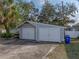 Detached two-car garage with a concrete driveway, offering convenient parking and extra storage space on the property at 1841 Casco St, Lakeland, FL 33801