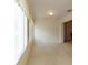 Sun-drenched sunroom with large windows, neutral carpet, and natural light at 1961 Rocky Pointe Dr, Lakeland, FL 33813