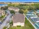 A high aerial view of apartments in a community with manicured lawns and fenced yards at 205 Terrace Ridge Cir # 205, Davenport, FL 33896