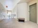 Hallway view with carpeted floors, neutral walls, and a door leading to unit 205 at 205 Terrace Ridge Cir # 205, Davenport, FL 33896