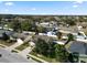 Residential neighborhood with mature trees, manicured lawns, and diverse architectural styles at 2160 Country Manor St, Bartow, FL 33830