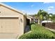 Close-up view of home's front exterior and front yard landscaping at 2160 Country Manor St, Bartow, FL 33830