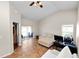 Living room featuring tile floors, a ceiling fan, and a sliding glass door to the porch at 2160 Country Manor St, Bartow, FL 33830