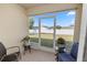 Relax on this screened porch with view of backyard at 2160 Country Manor St, Bartow, FL 33830