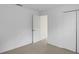 Neutral bedroom featuring a closet and a doorway at 2454 Harrison Place Blvd, Lakeland, FL 33810