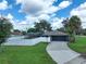 Charming home with a screened pool, fenced yard, and long driveway at 280 Spring Lake Hills Dr, Altamonte Springs, FL 32714