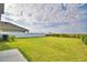 Expansive fenced back yard featuring healthy green grass and room to play at 2816 Ivy Lake Ct, Lakeland, FL 33811