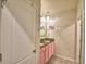 Bathroom featuring a double vanity with granite countertops and updated fixtures at 2816 Ivy Lake Ct, Lakeland, FL 33811