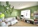 Bedroom featuring daybed, vanity and hanging swing near a window at 2816 Ivy Lake Ct, Lakeland, FL 33811