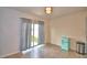 Bright dining area features a sliding door and a mini-fridge at 2816 Ivy Lake Ct, Lakeland, FL 33811