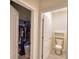 Hallway featuring an open closet and a nearby bathroom at 2816 Ivy Lake Ct, Lakeland, FL 33811