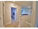 Second-floor hallway leading to ' bedroom and Gathering room at 2816 Ivy Lake Ct, Lakeland, FL 33811