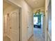 Hallway showcasing access to a bedroom and a closet at 2816 Ivy Lake Ct, Lakeland, FL 33811