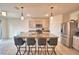 Spacious kitchen featuring granite island with seating and stainless steel appliances at 2816 Ivy Lake Ct, Lakeland, FL 33811