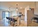 Spacious kitchen featuring granite island with seating and stainless steel appliances at 2816 Ivy Lake Ct, Lakeland, FL 33811