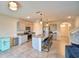 Well-equipped kitchen features stainless steel appliances and island with barstool seating at 2816 Ivy Lake Ct, Lakeland, FL 33811