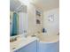 Modern bathroom with a round tub and shower at 2907 Marion Way # 2907, Haines City, FL 33844