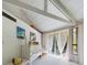 Bright bedroom with white furniture and large window at 2907 Marion Way # 2907, Haines City, FL 33844