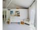 Light-filled bedroom featuring white dresser and seating at 2907 Marion Way # 2907, Haines City, FL 33844