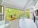 Eat-in kitchen with glass table and wooded views at 2907 Marion Way # 2907, Haines City, FL 33844