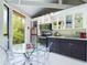 Modern kitchen with dark cabinets and stainless appliances at 2907 Marion Way # 2907, Haines City, FL 33844