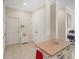 Entryway featuring tile flooring and a closet for storing coats and other items at 3019 Mission Lakes Dr, Lakeland, FL 33803