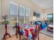 Cozy living room with a large window and a comfortable sofa at 3019 Mission Lakes Dr, Lakeland, FL 33803