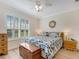 Inviting main bedroom with a ceiling fan and hardwood floors at 3019 Mission Lakes Dr, Lakeland, FL 33803