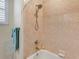 Shower featuring tile walls, a shower head, and a bathtub at 3019 Mission Lakes Dr, Lakeland, FL 33803