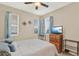 Cozy bedroom with natural light from windows, a comfortable bed, and modern decor at 3460 Canvas St, Kissimmee, FL 34741