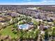 Aerial view showcases the beautiful community amenities: pool, playground, and gazebo at 3460 Canvas St, Kissimmee, FL 34741