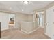 Bright hallway featuring neutral colors and white doors leading to other rooms at 3460 Canvas St, Kissimmee, FL 34741
