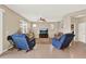 Bright living room features neutral paint, lots of natural light, tile flooring, and ceiling fan at 3460 Canvas St, Kissimmee, FL 34741